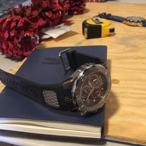 Invicta, red face and black band Pro Diver